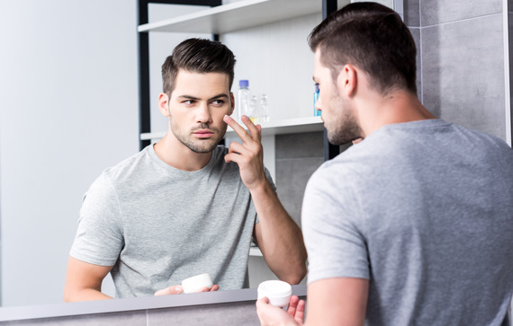 Clariant Image Handsome Man Applying Facial Cream 20230605