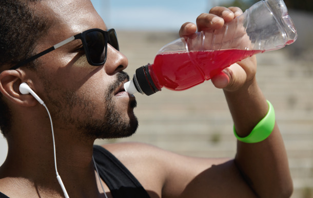 28655_teaser_ClariantAfrican runner with athletic body listening to tracks with headphones