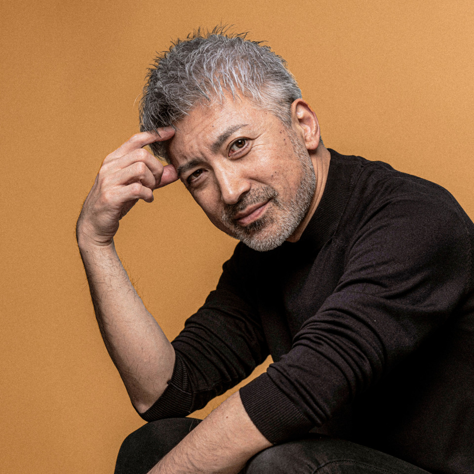 32708_product_ClariantPortrait of a handsome middleaged man with gray hair and a beardHe is