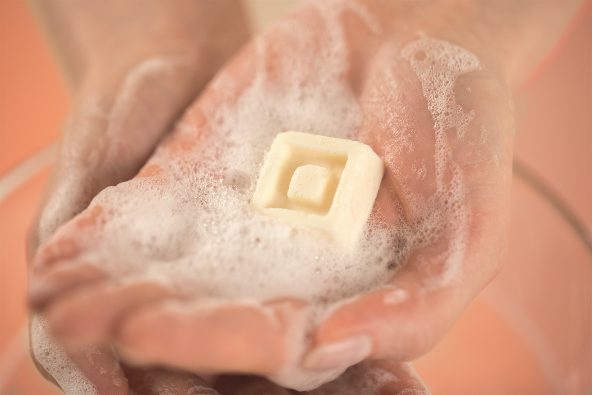 Solid shampoo formulation with pampering and protective after-feel.