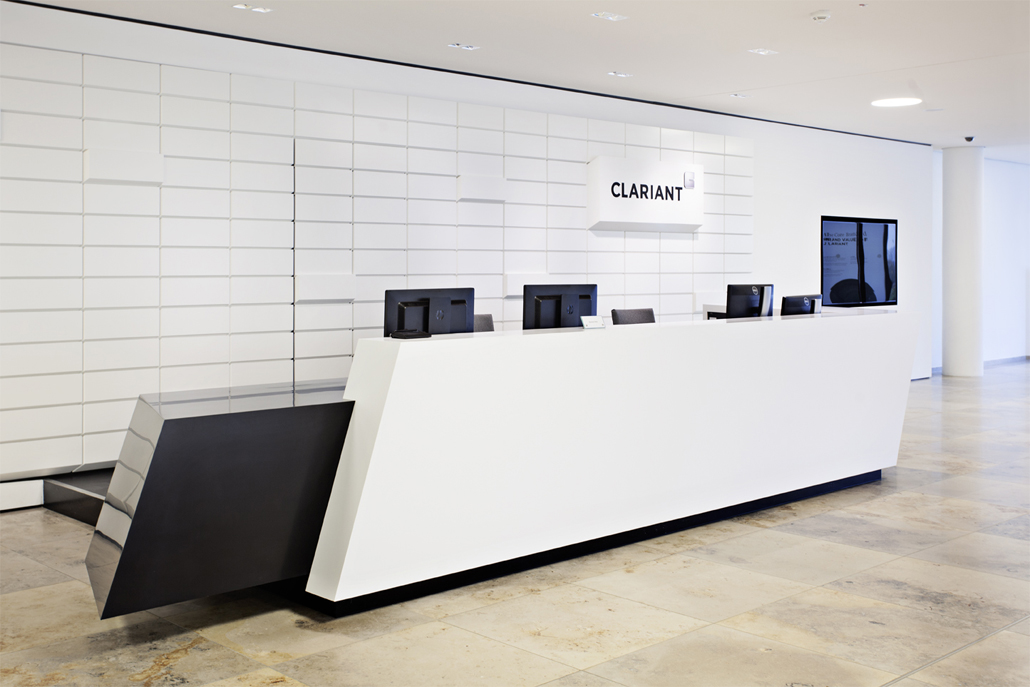  At the reception desk, visitors are greeted warmly.