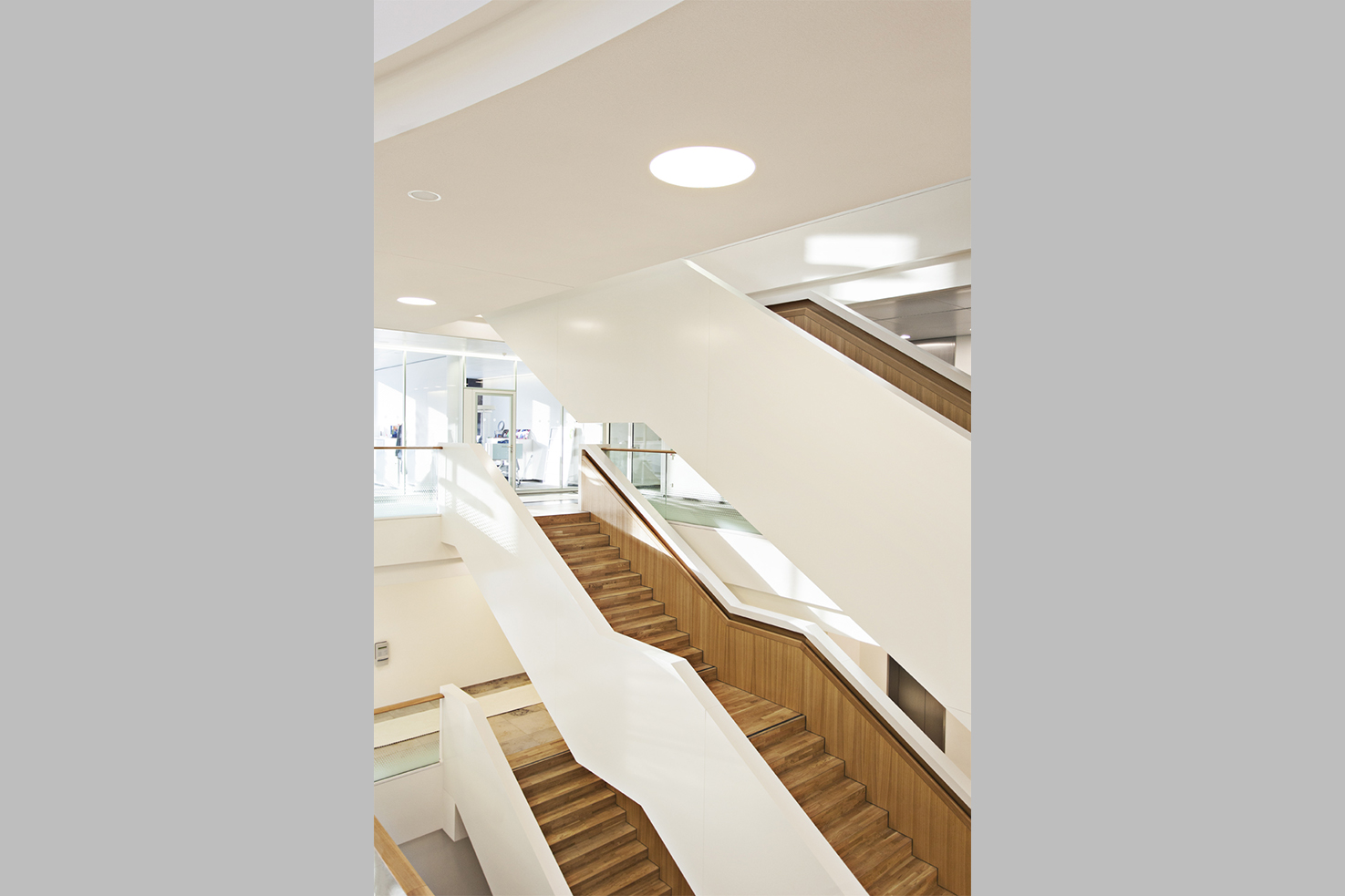  All floors are connected by the centrally located, open staircase that fits seamlessly into the overall structure of the building.