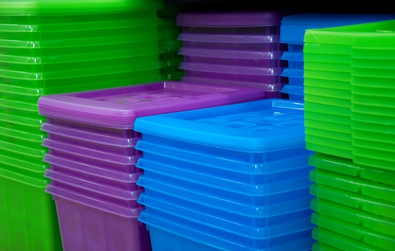 Plastic boxes in blue, purple and green